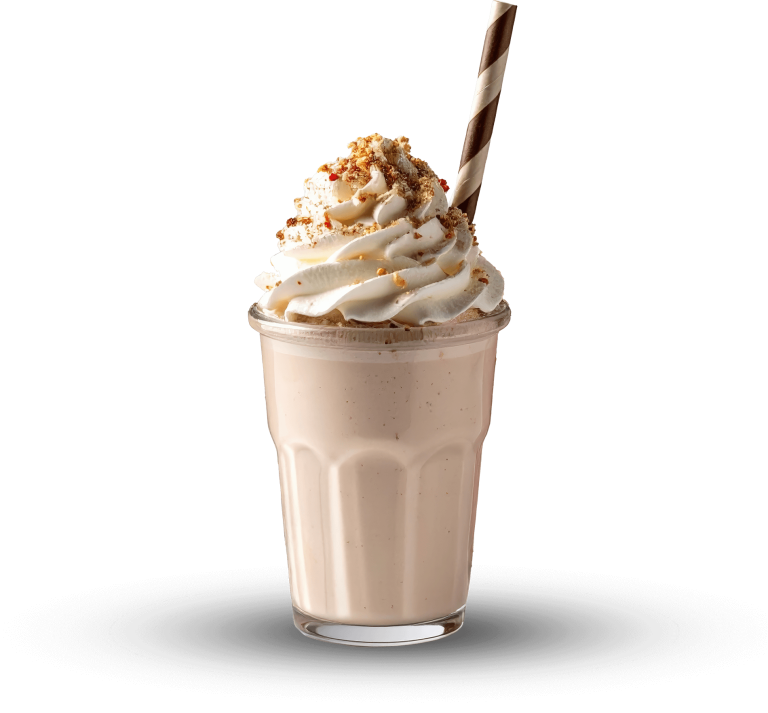 Milchshake Milchshake in einem Becher mit Sahne und Karamellstreuseln, dekoriert mit einem Strohhalm.